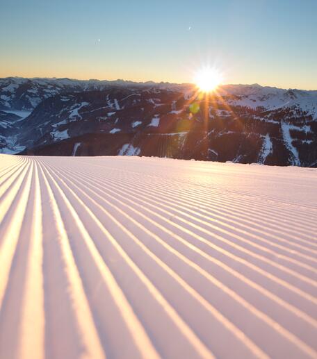 ski slope at sunset